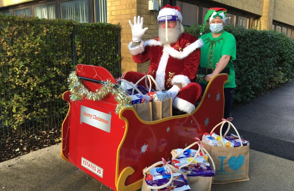 Santa waving in sleigh